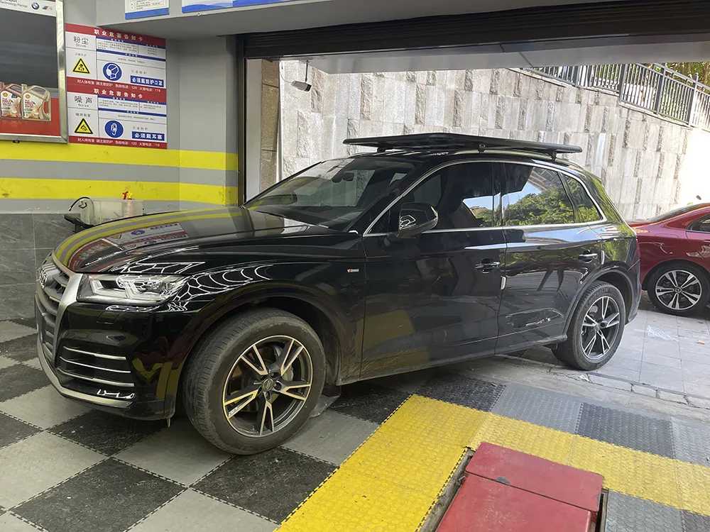 Audi Q5 roof rack installation completed - full vehicle view