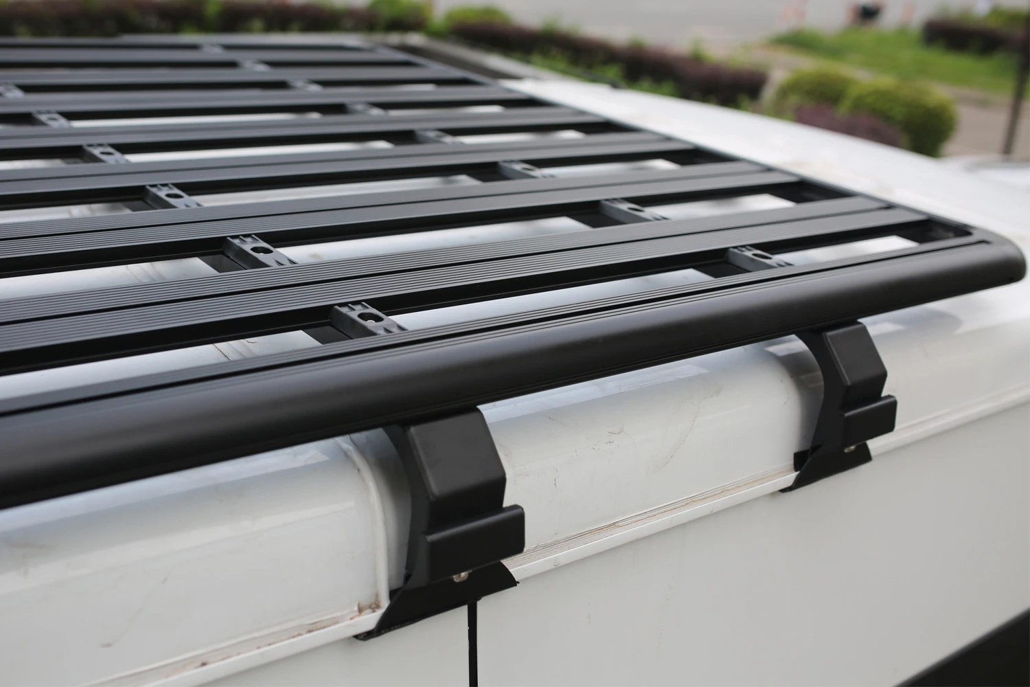 The installation of the bracket with a rain gutter on the roof